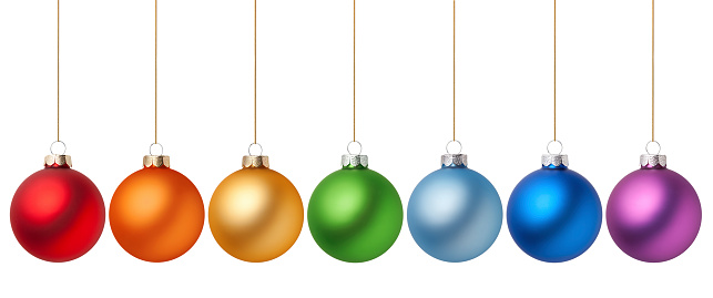 Christmas baubles all colors of the rainbow isolated on white background. Photography in high resolution.