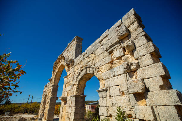 the temple of zeus of diokaesareia ( uzuncaburc ) ancient city in mersin, turkey - tyche stok fotoğraflar ve resimler