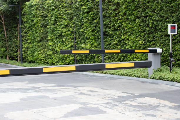 istock automatic barrier for home village security system with CCTV. security gate for resident. 1350994316