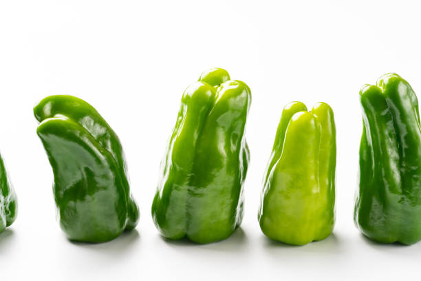 Green bell pepper on white background