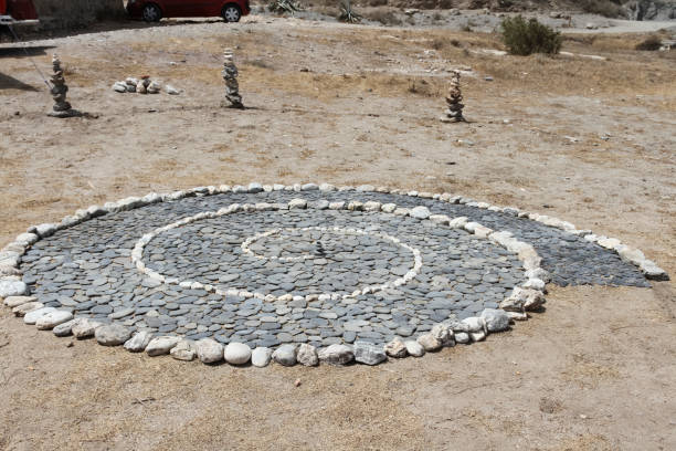 istock Stones stacked balanced in the sand on the beach, Buddhism mode 1350995556