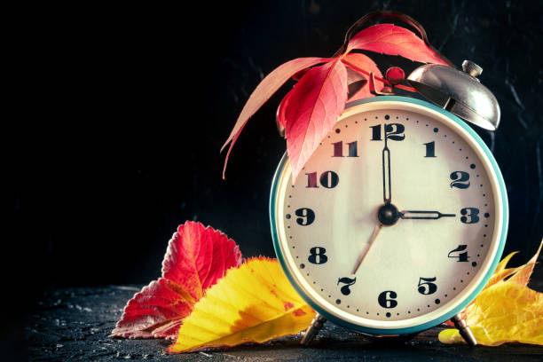 istock Daylight Saving Time concept, fall back in autumn, with a place for text 1350997773