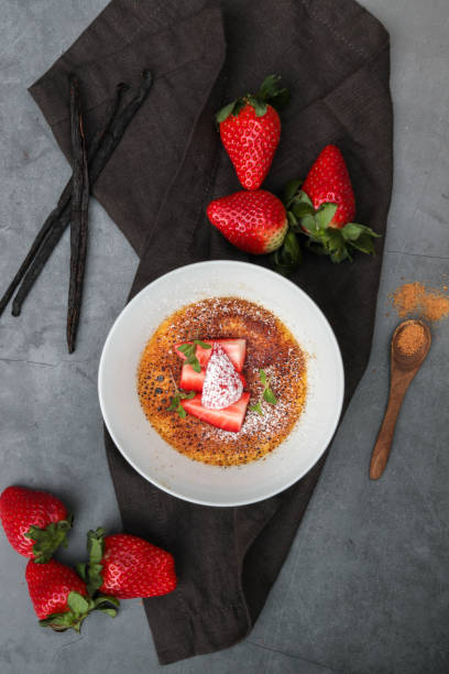 istock Creme Brulee Dessert with Vanilla and Strawberries 1351003132