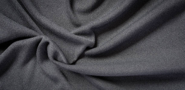istock texture of black coton fabric background 1351003191