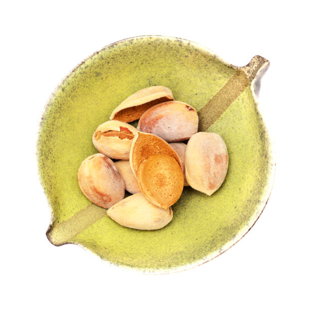 horticulture of gran canaria -  ripe almond nuts still in the outer soft shell, 
picked directly from the trees - image alternative energy canary islands color image imagens e fotografias de stock