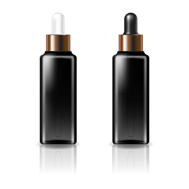 istock Black clear square cosmetic bottle with white and black-copper dropper lid for beauty or healthy product. 1351007960