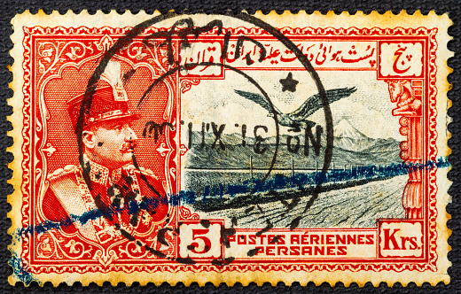 Stamp printed in Iran showing the portrait of the Iranian Shah, Reza Shah Pahlavi, circa 1929.