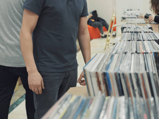 istock Man in vinyl records shop 1351011742