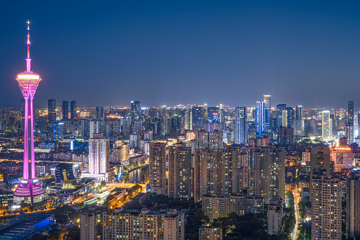 The bustling city of lights and wine green photographed at night in Chengdu
