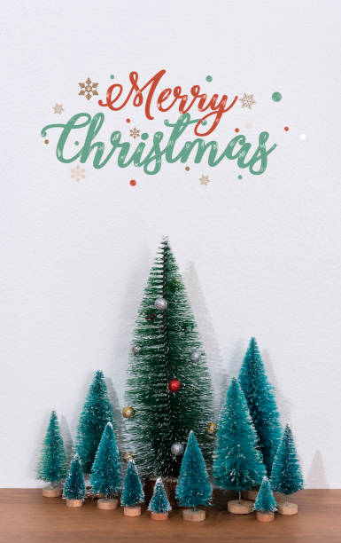 istock Christmas tree decoration and text merry christmas on wall background. 1351024450