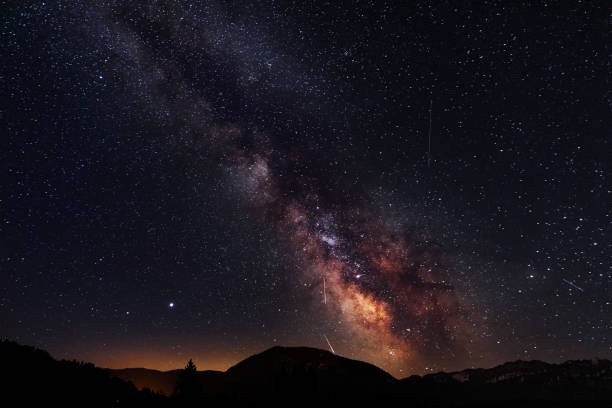 istock Milkyway Galaxy with Meteor 1351025066