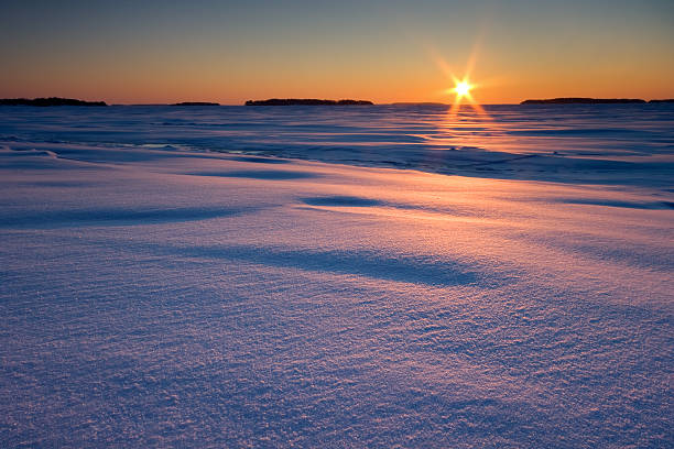 sunrise 冬の朝 - snow winter coastline sunrise ストックフォトと画像