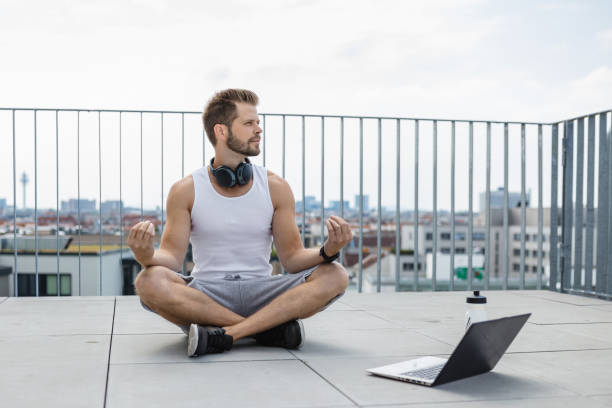 istock Handsome man training and working out outdoors 1351034498