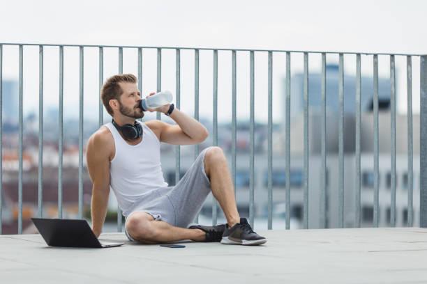 istock Handsome man training and working out outdoors 1351034675