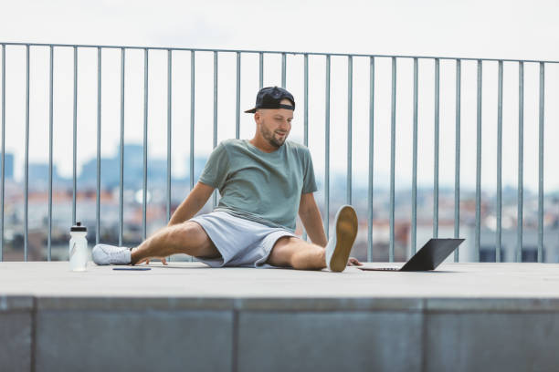 istock Handsome man training and working out outdoors 1351034966