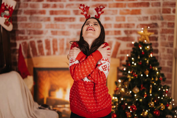 istock On Christmas, hug yourself as tight as you can 1351035382