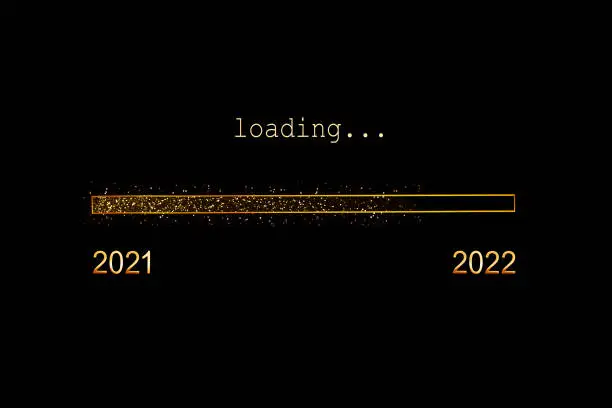 Photo of 2022 loading, gold glitter progress bar on black background, new year holiday greeting card