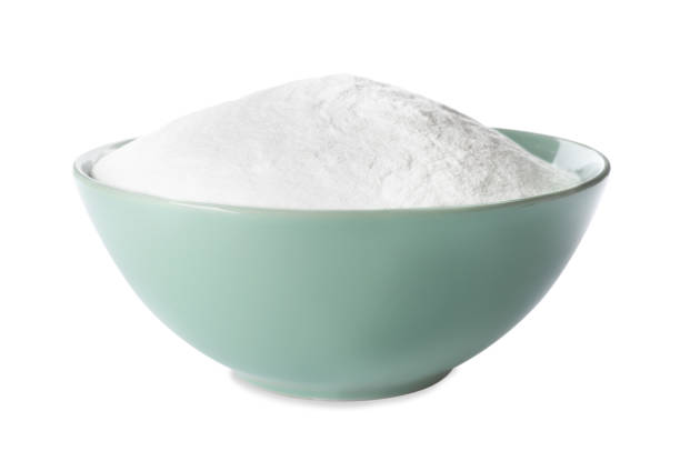 istock Baking soda in ceramic bowl isolated on white 1351039784