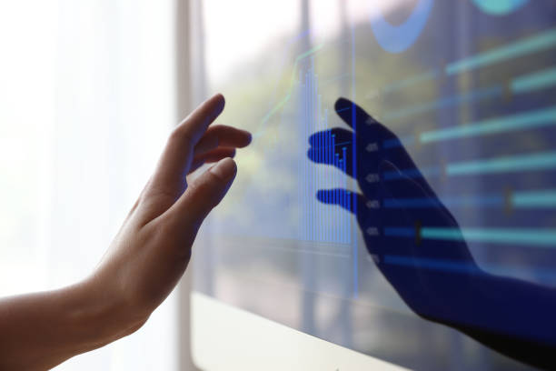 istock Woman working with modern computer indoors, closeup 1351045315