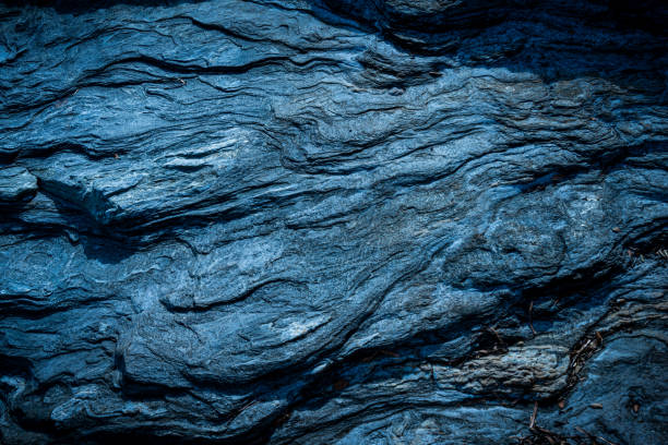 istock Natural stone or rock background ,granite metamorphic rock weathered on beach . 1351046132