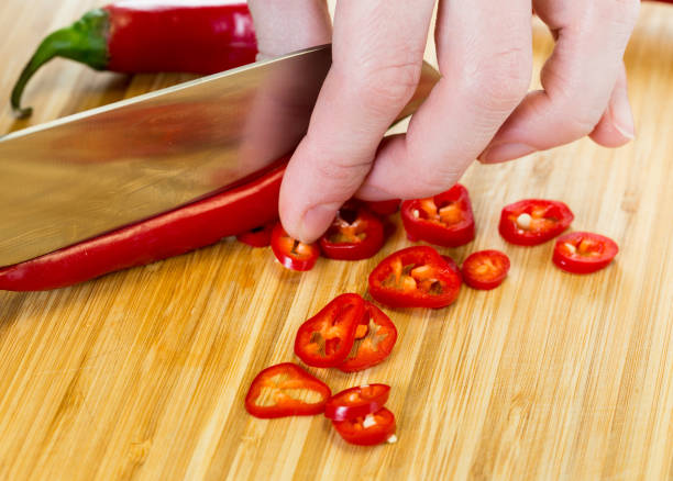 istock red hot chili peppers on a wooden board 1351049254