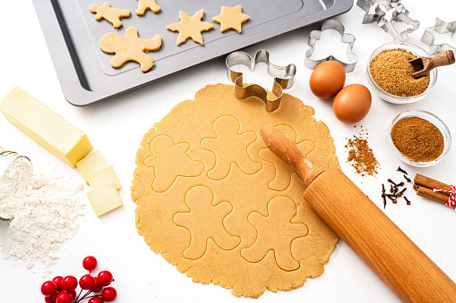 Ingredients for making christmas cookies with jam.