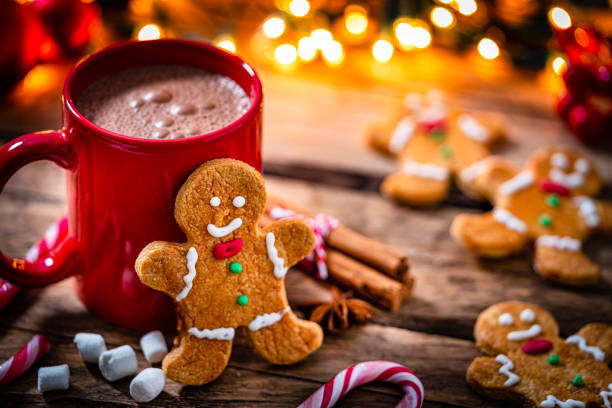 istock Christmas hot chocolate and gingerbread man cookies 1351059501