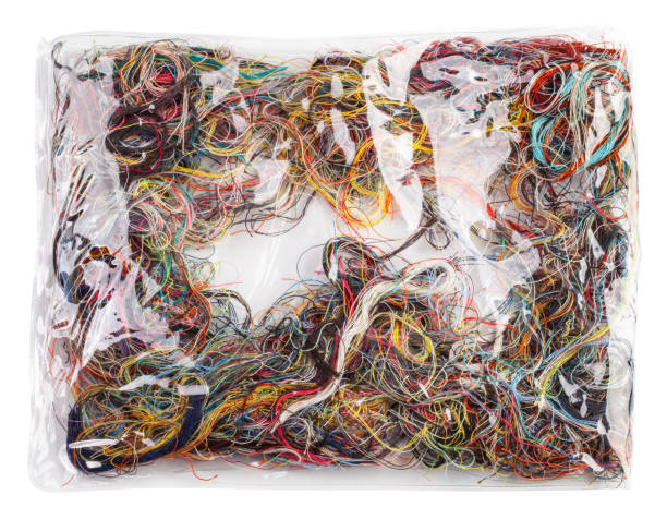 istock Colorful tangled threads isolated on white background with clipping path. Closeup 1351063028