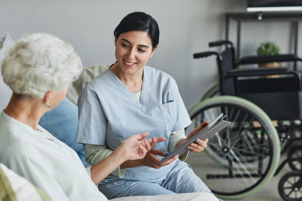istock Nurse in Retirement Home 1351063562