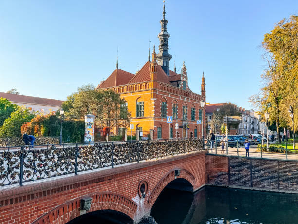 The heart of the old town of Gdansk in a sunny fall day. View to the old town hall (Ratusz Staromiejski) and \