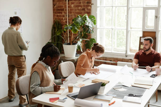 istock Diverse Team of Architects in Office 1351067053