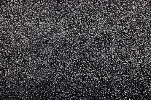 Black asphalt road textured