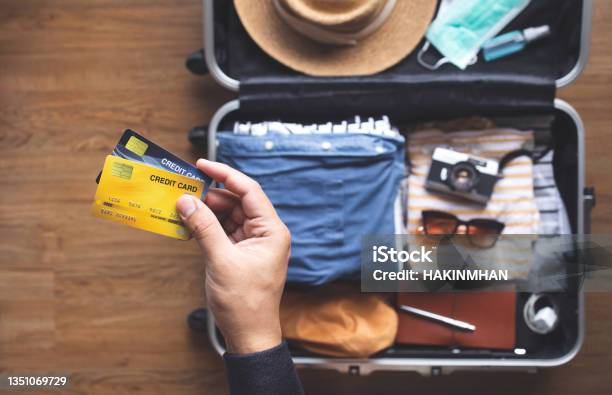 Young Person Using Credit Cards For Payment On Vacation Or Holiday Tripconvenient Lifestyle With Technology Stock Photo - Download Image Now