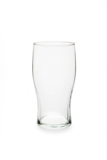 istock Empty pint glass isolated against white background. 1351072446