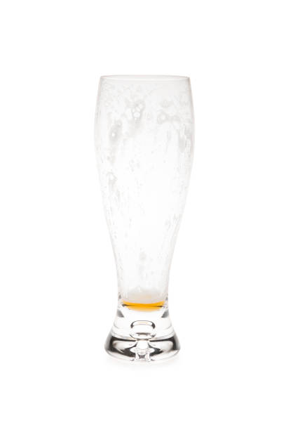 istock Empty Glass With Small Amount of Beer. 1351072585