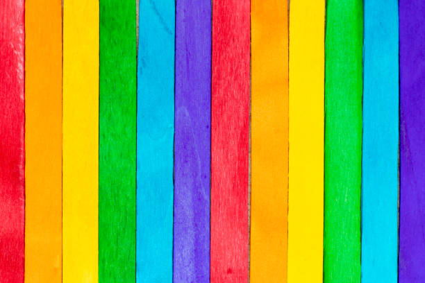 istock Multi color wood plank use as textured background, frame, decoration with copy space (Concept for rainbow or LGBT) 1351074444