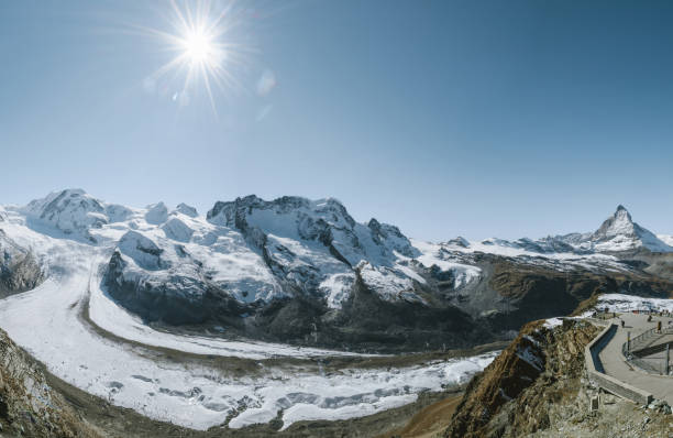istock wide panoramic view on Monte Rosa and Gorner Glacier and Matterhorn in the background 1351074607
