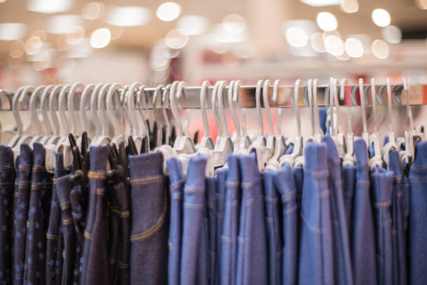 istock Hangers at a clothing store 1351074690