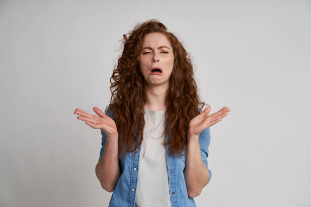 Desperate young woman at the studio