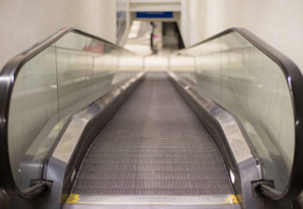 Gangway. A walkway in an empty hall. Crawler in a mall.