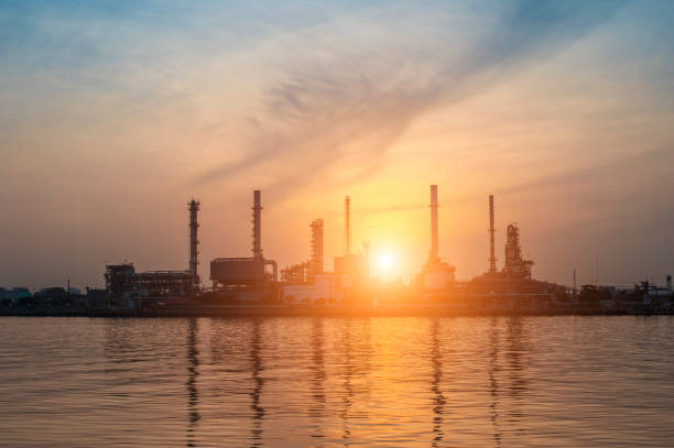 istock Oil Refinery with sunrise 1351075979