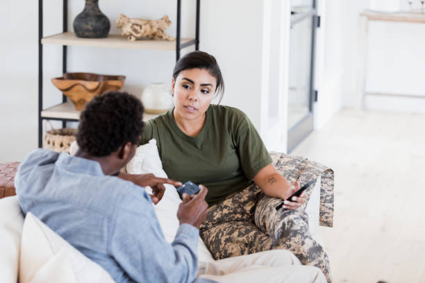istock Wife listens as unrecognizable husband talks about credit card 1351076135