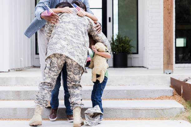 istock Family welcomes soldier mom home from deployment 1351076138