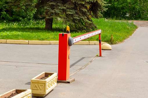 Road automatic barrier for entering the parking lot