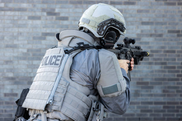 istock Swat Police Officer Shooting With Firearm 1351077244