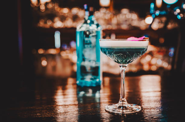 istock cocktail with gin, lime juice and soda on bar counter 1351077586