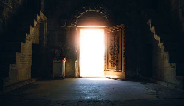 istock opened door with light in retro style 1351077626