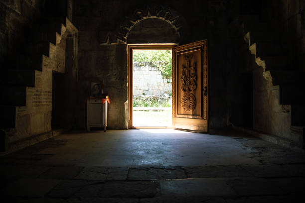 istock opened door with light in retro style 1351077635