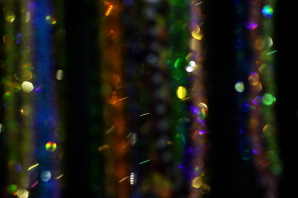 istock Abstract bokeh background.Defocused festive garland.Overlay layer.Holiday concept. 1351078203