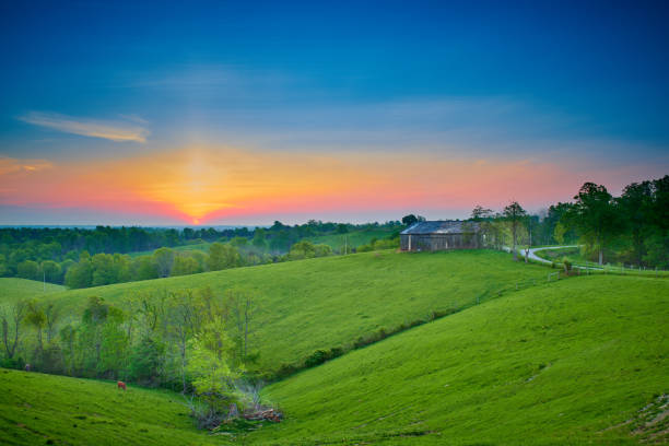 istock Sunrise Over Kentucky Farm. 1351078900